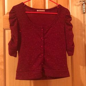 Red sweater with sparkles